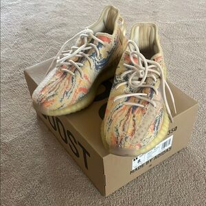 Adidas Yeezy Cream and Orange Sneakers with Unique Knit Pattern